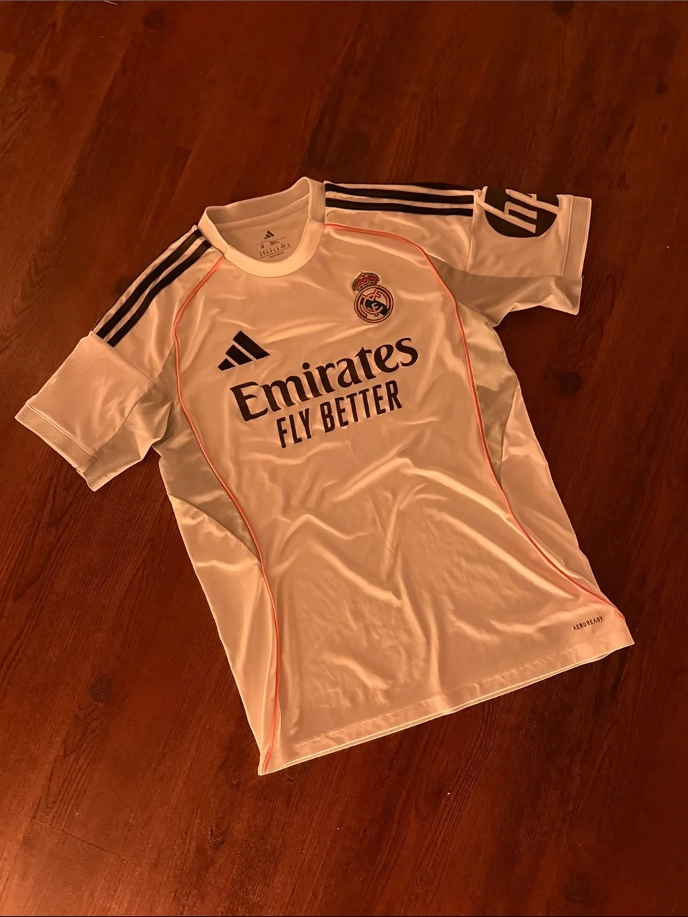 adidas White Real Madrid Kids Jersey with Navy Logos and Orange Piping